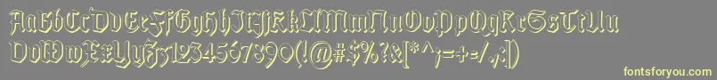 TypographergotischSchattenS Font – Yellow Fonts on Gray Background