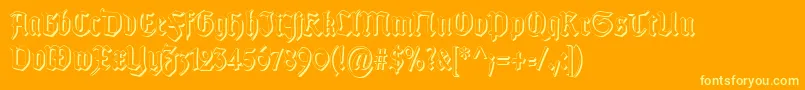 Шрифт TypographergotischSchattenS – жёлтые шрифты на оранжевом фоне