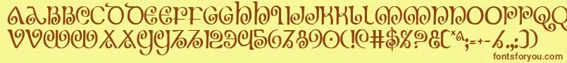 フォントTheShireCondensed – 茶色の文字が黄色の背景にあります。