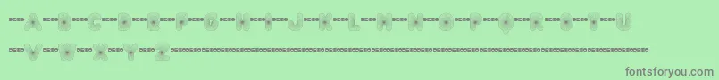 FtAcidtest2Progressive-Schriftart – Graue Schriften auf grünem Hintergrund