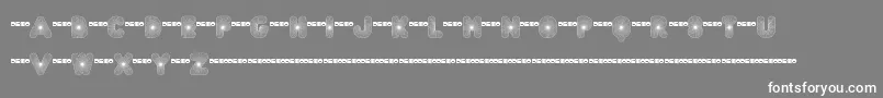 FtAcidtest2Progressive Font – White Fonts on Gray Background