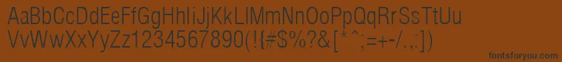 フォントArenaCondLight – 黒い文字が茶色の背景にあります