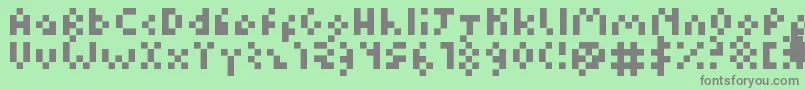 Czcionka Kuadriculado7luas – szare czcionki na zielonym tle