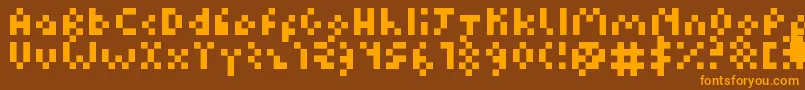 Fonte Kuadriculado7luas – fontes laranjas em um fundo marrom