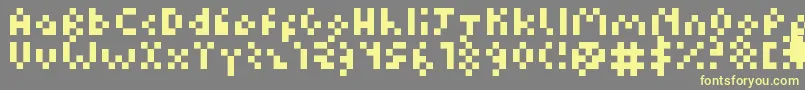 Шрифт Kuadriculado7luas – жёлтые шрифты на сером фоне