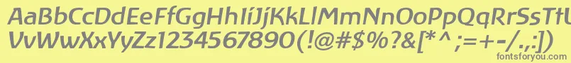 フォントLinotypeAtlantisMediumItalic – 黄色の背景に灰色の文字