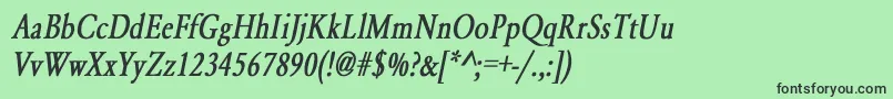 フォントYearlindNormalCondensedBoldItalic – 緑の背景に黒い文字