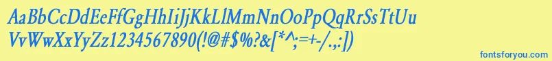 フォントYearlindNormalCondensedBoldItalic – 青い文字が黄色の背景にあります。