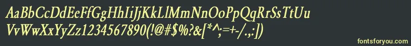 YearlindNormalCondensedBoldItalic Font – Yellow Fonts on Black Background