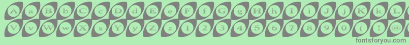 フォントWide Eyed – 緑の背景に灰色の文字