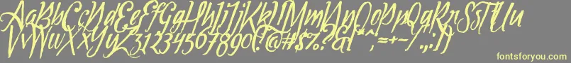 Tipbrush1Slanted Font – Yellow Fonts on Gray Background