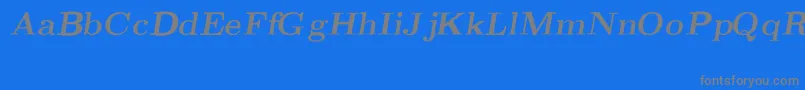 フォントCmRomanBoldslantedext – 青い背景に灰色の文字