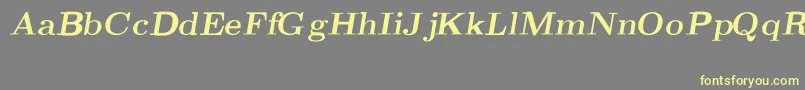 CmRomanBoldslantedext-fontti – keltaiset fontit harmaalla taustalla
