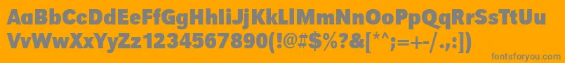 UrwgrotesktextnarBold-fontti – harmaat kirjasimet oranssilla taustalla