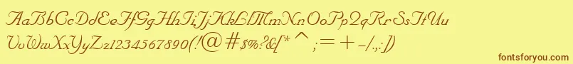フォントNuptialBt – 茶色の文字が黄色の背景にあります。