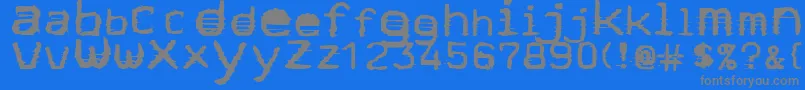 Stock-fontti – harmaat kirjasimet sinisellä taustalla