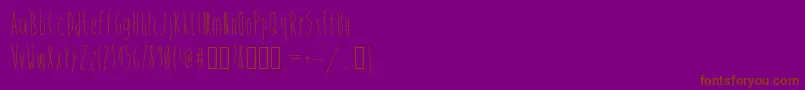 フォントMistress – 紫色の背景に茶色のフォント