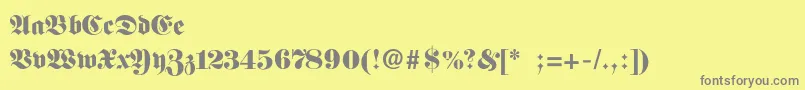 Fittipauldi-fontti – harmaat kirjasimet keltaisella taustalla
