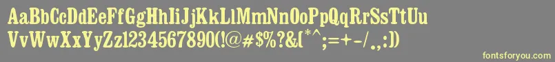 Dosmilcatorce Font – Yellow Fonts on Gray Background