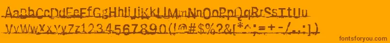 Czcionka Sabotage – brązowe czcionki na pomarańczowym tle