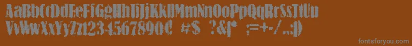BnArnon-fontti – harmaat kirjasimet ruskealla taustalla