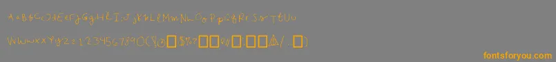 フォントEmilees – オレンジの文字は灰色の背景にあります。