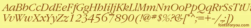 フォントGaramondtttItalic – 茶色の文字が黄色の背景にあります。