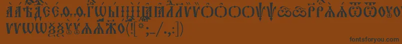 フォントOrthodox.TtIeucs8Caps – 黒い文字が茶色の背景にあります