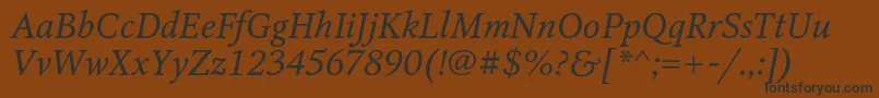 OctavacItalic-Schriftart – Schwarze Schriften auf braunem Hintergrund