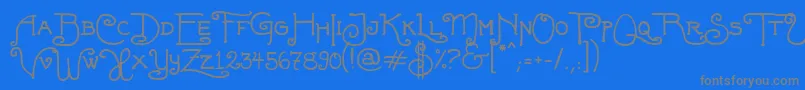 FortunaschweinComplete-fontti – harmaat kirjasimet sinisellä taustalla