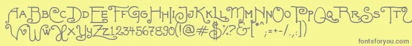 FortunaschweinComplete-fontti – harmaat kirjasimet keltaisella taustalla