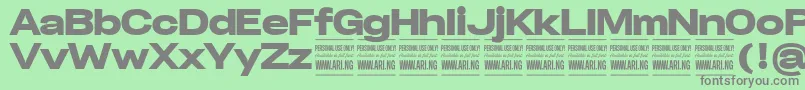 SpecifypersonalExpblack-Schriftart – Graue Schriften auf grünem Hintergrund
