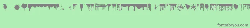 Dripping Font – Gray Fonts on Green Background