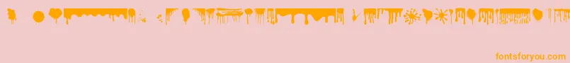 フォントDripping – オレンジの文字がピンクの背景にあります。