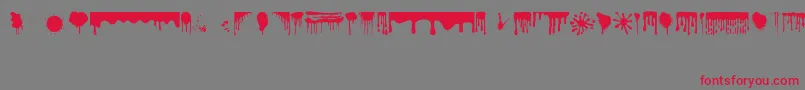 Czcionka Dripping – czerwone czcionki na szarym tle