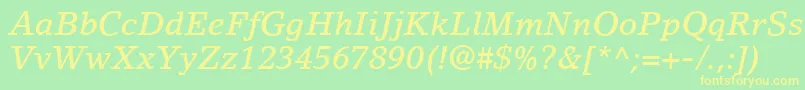 フォントLinoLetterLtMediumItalic – 黄色の文字が緑の背景にあります
