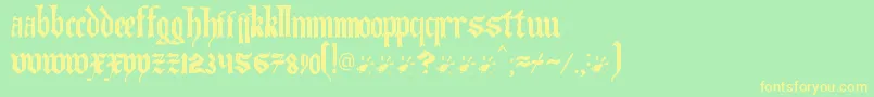 Artofilluminating-fontti – keltaiset fontit vihreällä taustalla