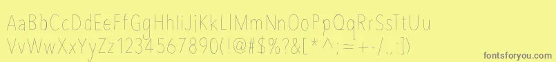 Avenircondensedhand Font – Gray Fonts on Yellow Background