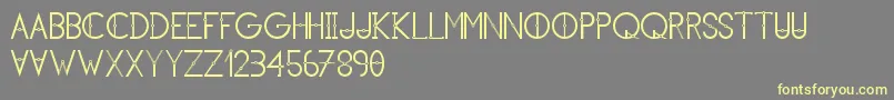 フォントKhCosan1 – 黄色のフォント、灰色の背景
