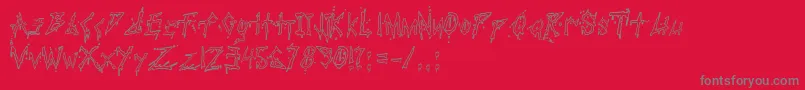 フォントPaulsBloodyFont – 赤い背景に灰色の文字