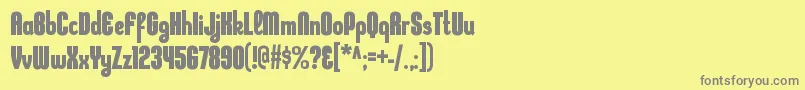 KleptocracycdBold Font – Gray Fonts on Yellow Background