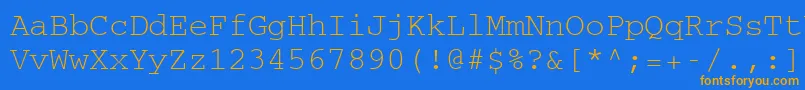 フォントCourierCeRegular – オレンジ色の文字が青い背景にあります。
