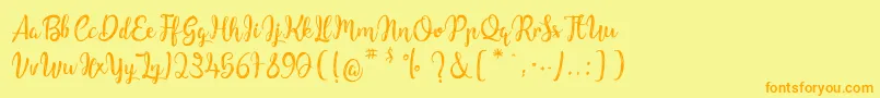Fonte ChildrenOfTheStarlight – fontes laranjas em um fundo amarelo