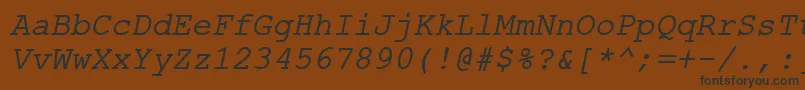 フォントErKurier866Italic – 黒い文字が茶色の背景にあります