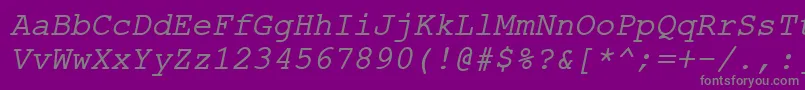 ErKurier866Italic-fontti – harmaat kirjasimet violetilla taustalla
