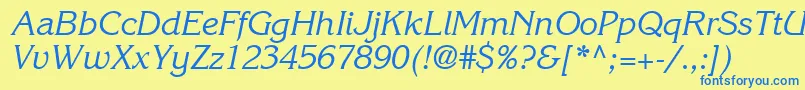 ItcKorinnaLtRegularKursiv Font – Blue Fonts on Yellow Background