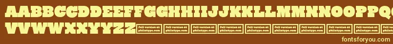 RynoSlabCaps-fontti – keltaiset fontit ruskealla taustalla
