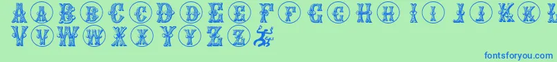 Goticcaps Font – Blue Fonts on Green Background