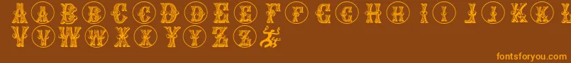 Goticcaps Font – Orange Fonts on Brown Background