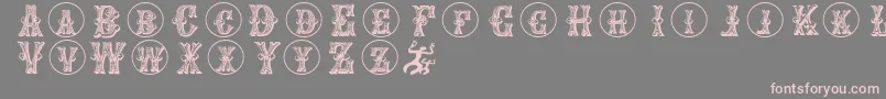 Goticcaps Font – Pink Fonts on Gray Background